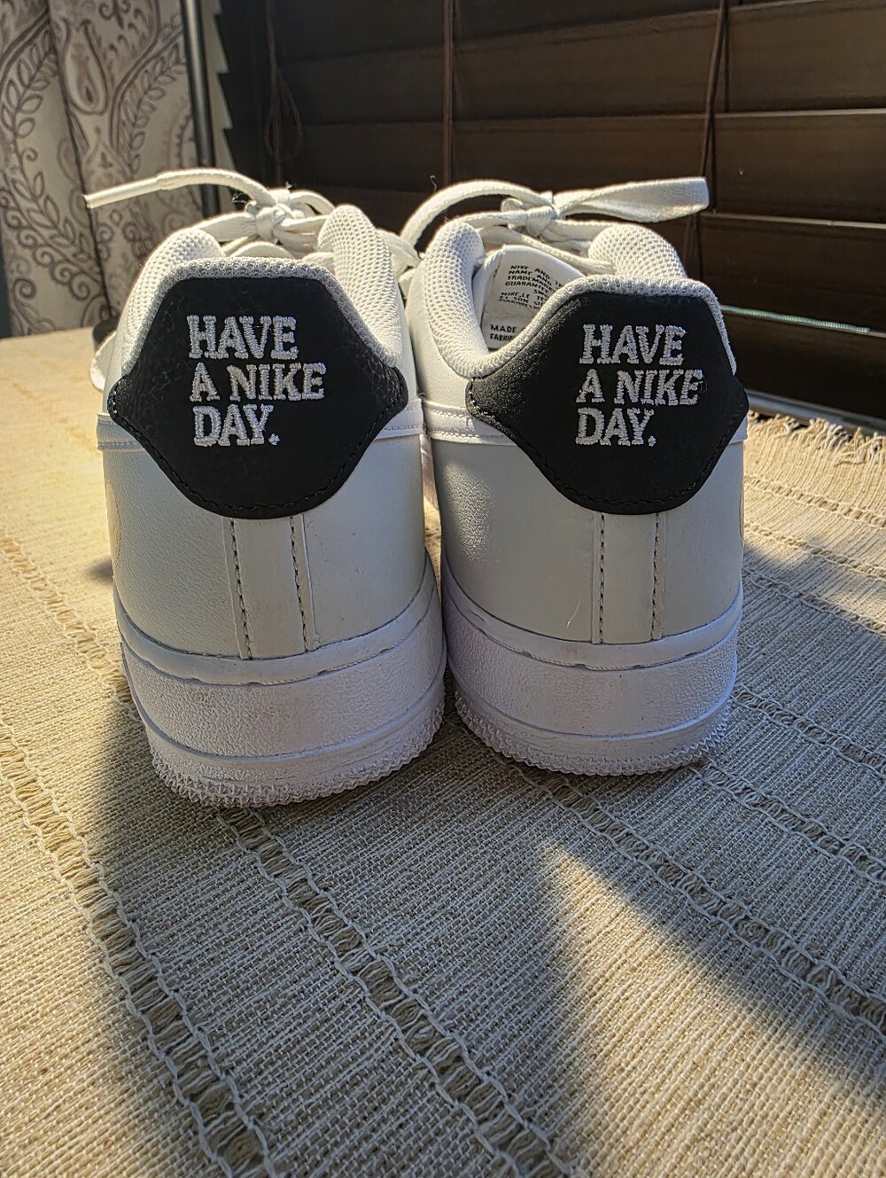 Nike White Low-Top Sneaker with Black Heel Tab - Picture 2 of 5